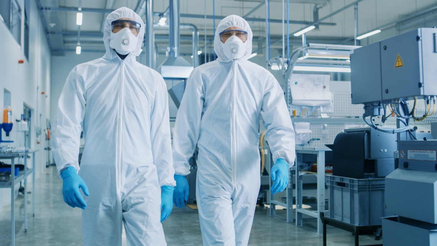 Technician working with semiconductor equipment